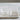 Misona white diatomite stone bath mat with a water splash on it