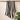 Black and off white beach towel made from organic cotton. Soft and sustainable towels for travel.