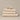 Organic cotton beige bathroom towels. Super soft ribbed towels in four sizes: hand towel, bath towel, bath sheet and face cloths.