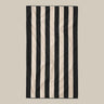 Organic cotton black and cream striped beach towel in a large size for a premium feel.