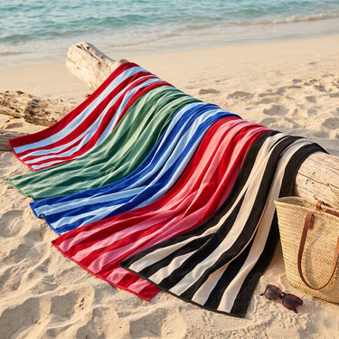 Colourful striped towels made from sustainable organic cotton. Large size beach towels, luxury quality.